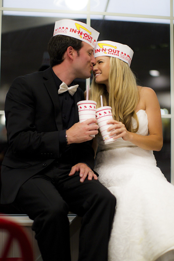 the happy couple sitting and eating take out - wedding photo by top Orange County, California wedding photographers D. Park Photography